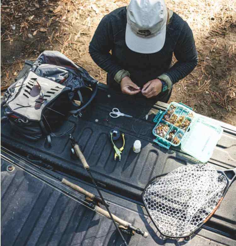 Kayakers exploring a rocky Irish coastline and cliffs, ideal for mixed fishing and touring.